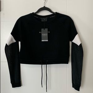 Alphalete crop sweater with mesh sleeves NWT